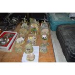 A collection of Lilliput Lane ornaments