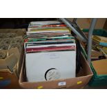 A box of various LPs