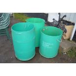 Three green water butts