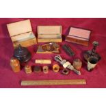A large box of treen items including pencil cases,