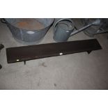 A long cast iron trough, 59" long approx.