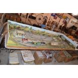 A large train set with a quantity of controllers,