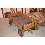 A small four wheel trailer with turntable, ring to