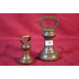 Two George V Bell weights (7lb) 1927, (4lb) 1923