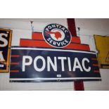 A "Pontiac" enamel advertising sign, approx. 36" x 26" in extremes