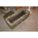 A large vintage stone trough, (43" x 17" x 12" approx.)