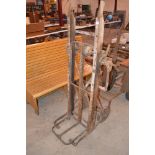 An old wooden and metal sack lifter, named to "Joh