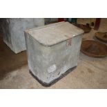 A galvanised metal storage bin