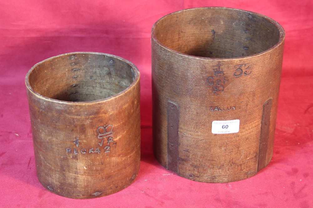 Two old wooden measures