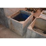 A small galvanised water tank