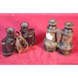 Two old pairs of binoculars