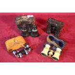 Four small pairs of binoculars and opera glasses,