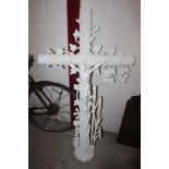 A large Victorian cast iron memorial cross