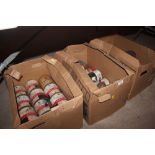 Three boxes of Parson automotive paint etc.