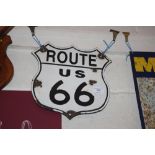 A "Route 66" shield shaped enamel sign, approx. 12" x 11¾" i
