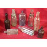 A box of vintage bottles including Ipswich and Col