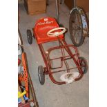 A Mini Kart child's pedal go kart