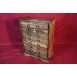 A 19th Century flight of drawers (eight), height 1