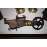 A carpet sewing machine by Singer
