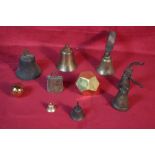 A collection of cow, sheep and goat bells