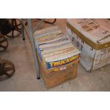 A box of Truck 1983 and 1984 magazines, plus 5 Tru