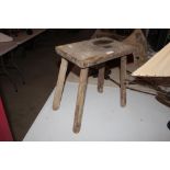 A small rustic stool