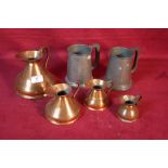 A set of four copper graduated jugs and two pewter
