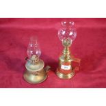 Two small brass oil lamps