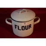 An enamel flour kitchen container