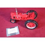 A Franklin Mint 1:12 scale Farmall model H tractor