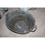 A small galvanised bath