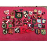 A quantity of cloth badges