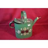 A decoupage watering can