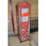 A tall metal oil cabinet with label to the interior for "The Vacuum Oil Company Westminster"