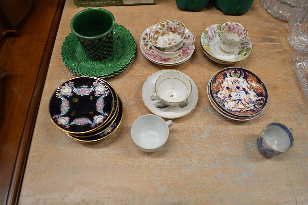 Two green glazed leaf plates; two Imari patterned