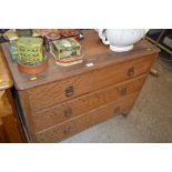 An oak three drawer chest