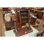 A Victorian mahogany swing frame toilet mirror