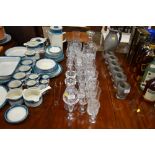 A quantity of various drinking glasses; a carafe e