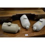 Three stoneware hot water bottles