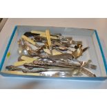 A tray of various cutlery; silver handled glove st