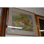 A gilt framed watercolour study of a bird of prey,