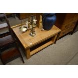 A light oak two tier coffee table