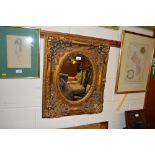 A 20th Century ornate gilt framed and bevelled edg