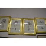 A set of four gilt framed French black and white p