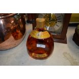 A bottle of John Haig & Company Dimple old blended