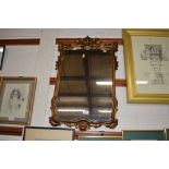 A modern gilt framed mirror