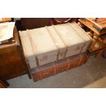Two wooden bound travelling trunks