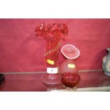 Two cranberry glass vases and cranberry glass salt