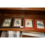 A set of four small framed prints depicting variou