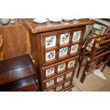 A Continental pine and tile chest, fitted three dr